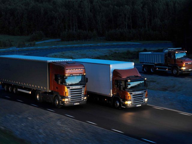 Three-orange-Scania-trucks-640x480.jpg